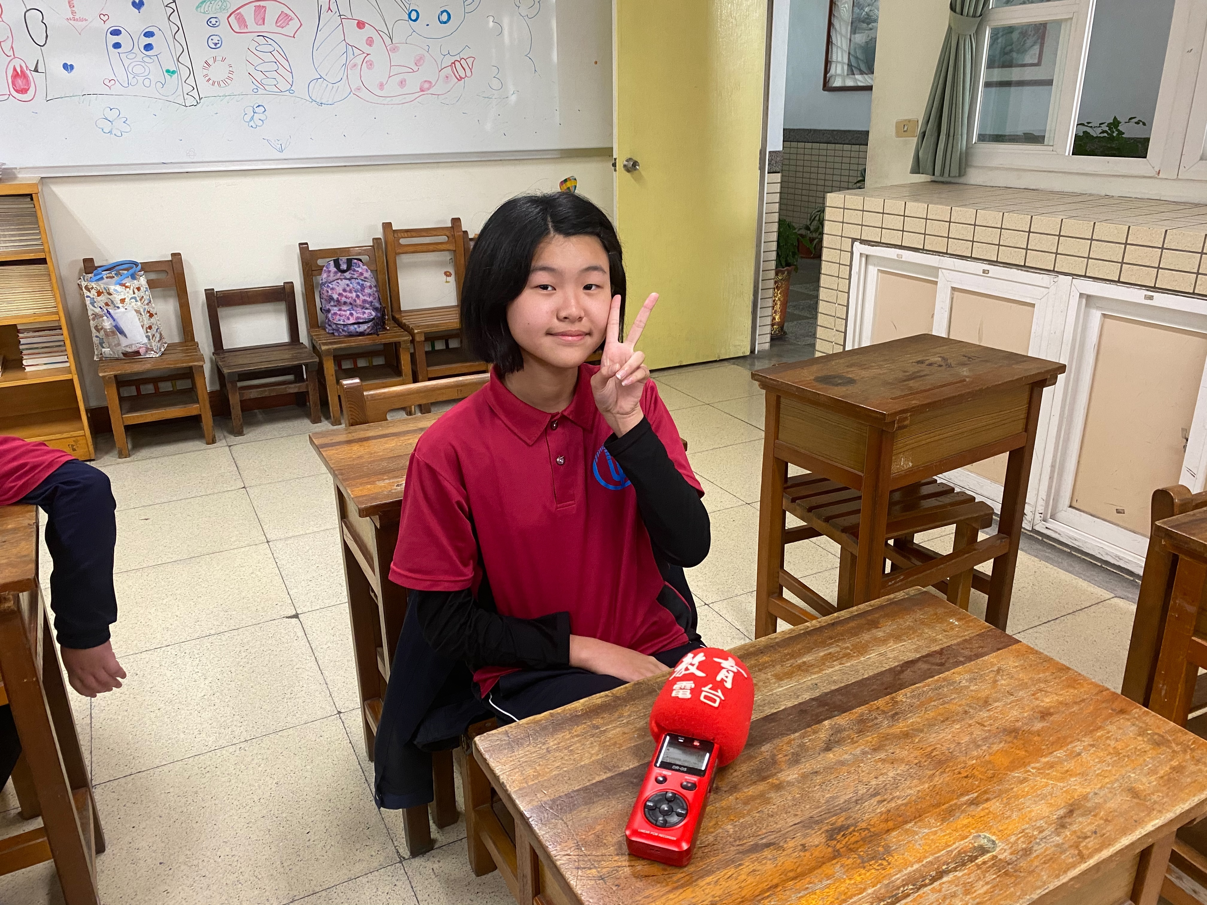 黃昱婷同學分享，如果街上都沒有車子她最想做的事情