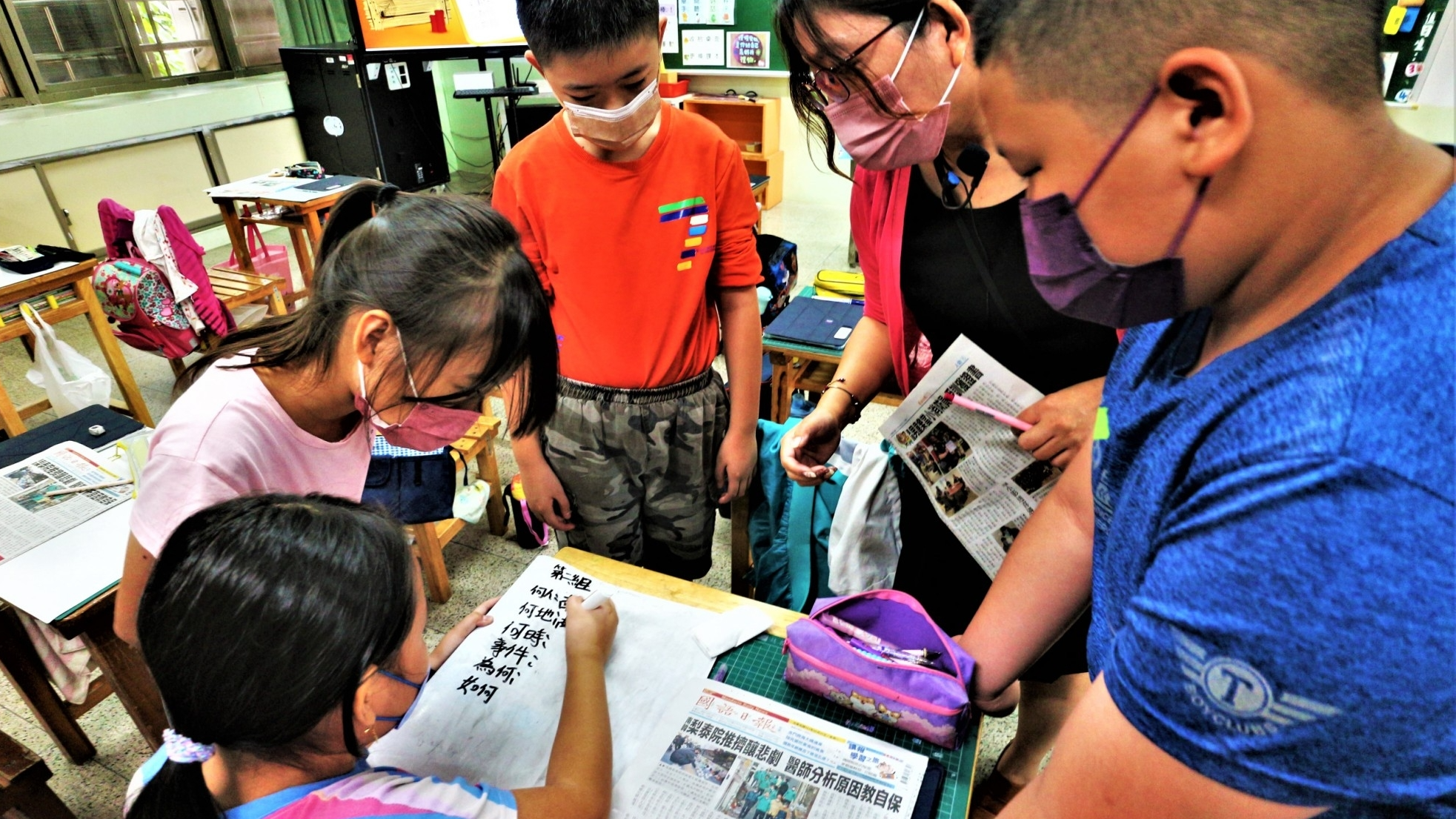 用讀報開展媒體素養教育_屏東佳冬鄉玉光國小讀報教學場（莊舒仲攝影）